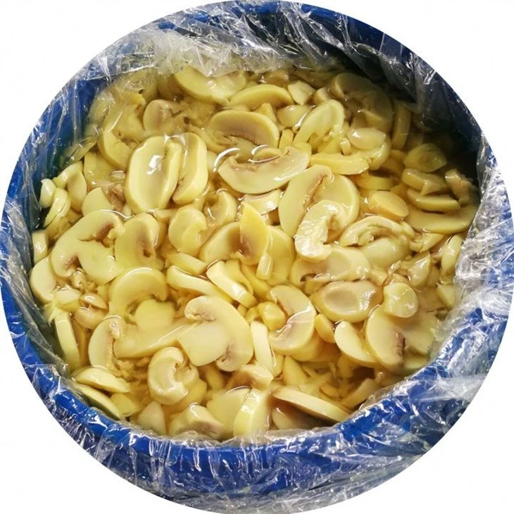 Slice champignon mushroom in brine in drum
